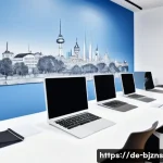Home 19 로우코스트 비즈니스 모델의 브랜드 관리 전략 - A modern, minimalist office scene showing a diverse small team of professionals collaborating around...